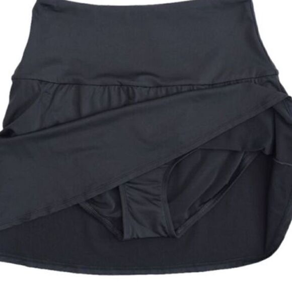 Coco Reef Ultra Soar Swim Skort Misses
High waist Castle Black swimwear,… - Picture 3 of 11